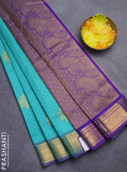 Silk cotton saree teal green and blue with allover self emboss jacquard & zari buttas and rich zari woven border