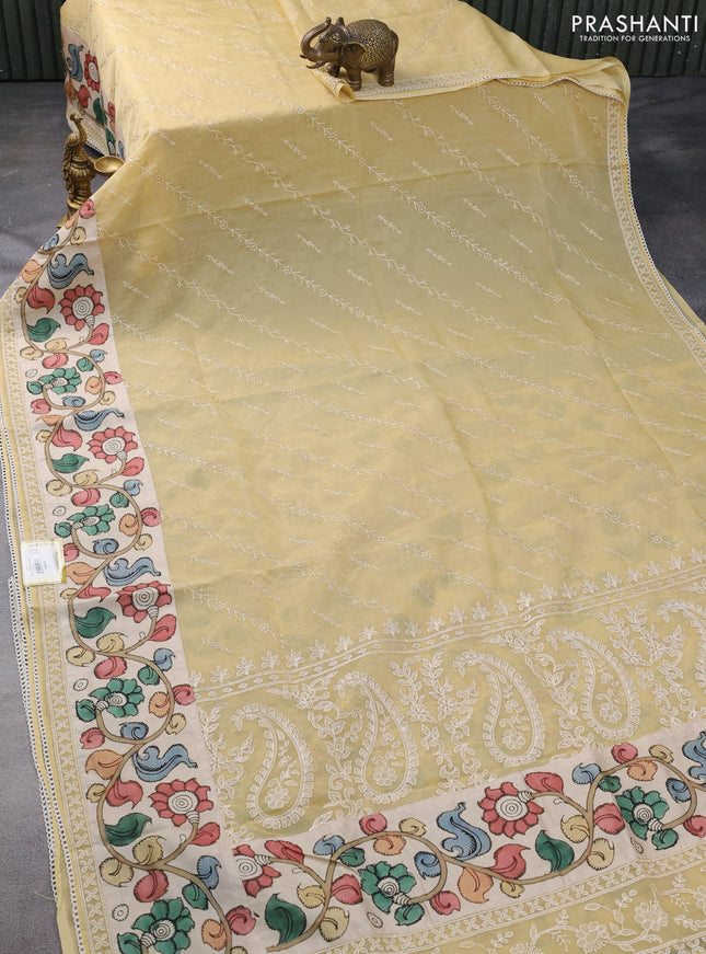 Semi organza saree sandal and beige with allover embroidery work and applique pallu & blouse