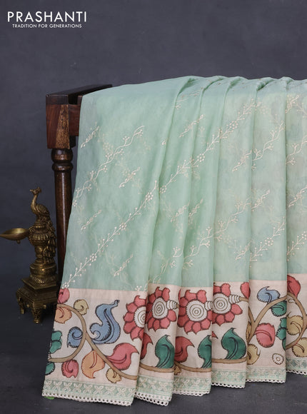 Semi organza saree pastel green and beige with allover embroidery work and applique pallu & blouse