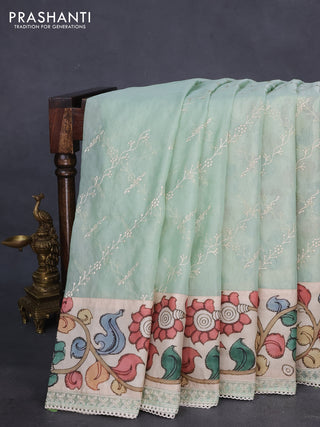 Semi organza saree pastel green and beige with allover embroidery work and applique pallu & blouse
