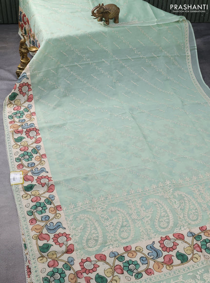 Semi organza saree pastel green and beige with allover embroidery work and applique pallu & blouse
