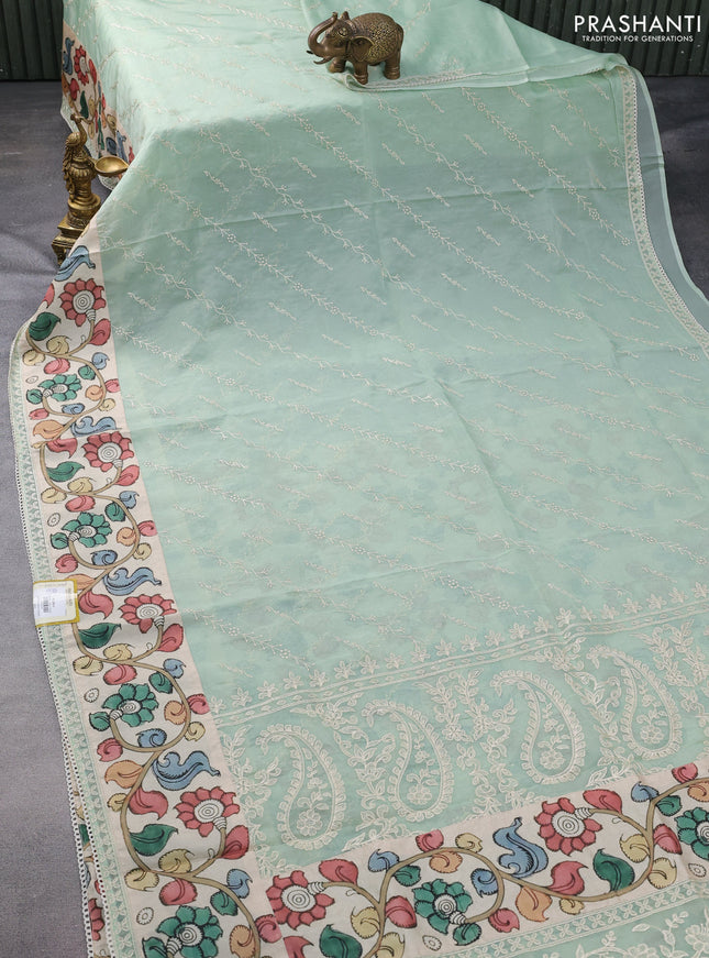 Semi organza saree pastel green and beige with allover embroidery work and applique pallu & blouse