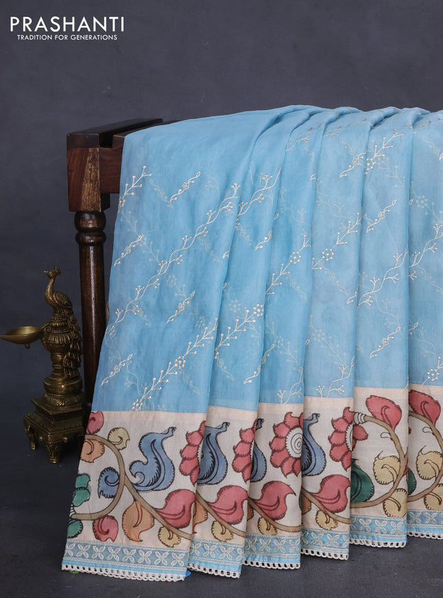 Semi organza saree pastel blue and beige with allover embroidery work and applique pallu & blouse