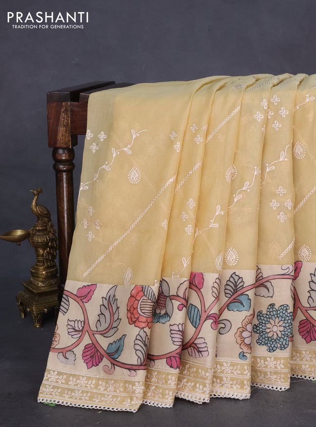 Semi organza saree sandal and beige with allover embroidery work and applique pallu & blouse