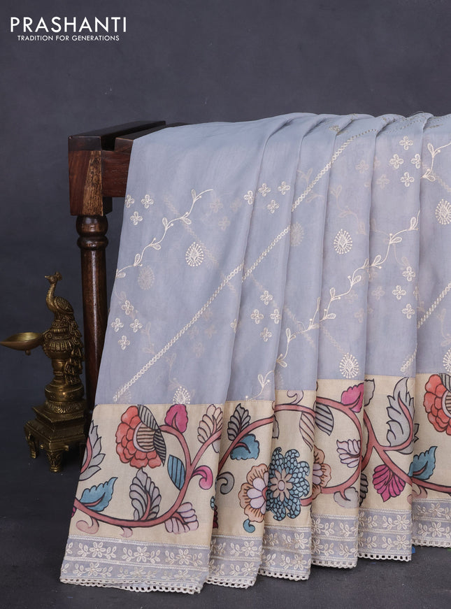 Semi organza saree pastel grey and beige with allover embroidery work and applique pallu & blouse