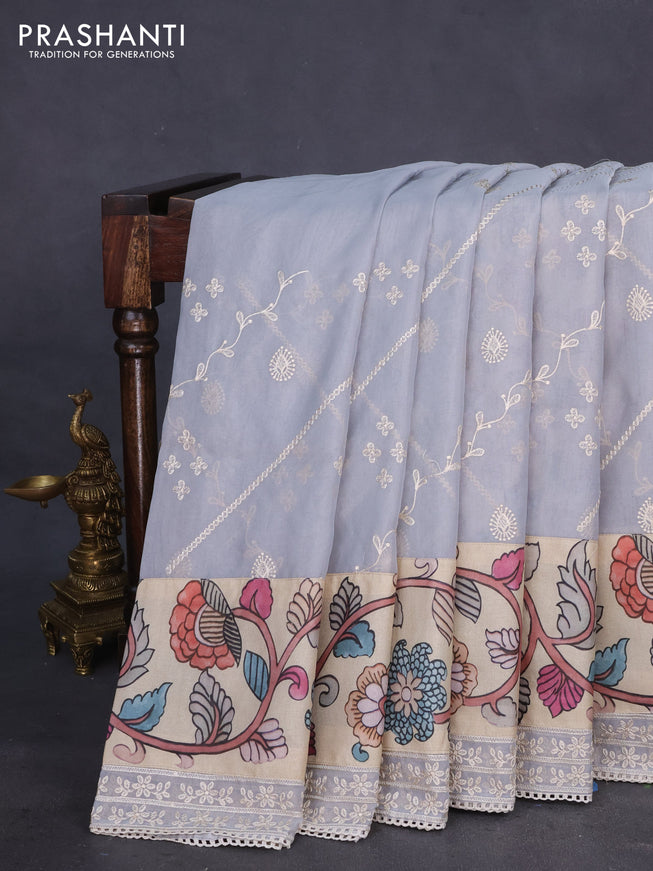 Semi organza saree pastel grey and beige with allover embroidery work and applique pallu & blouse