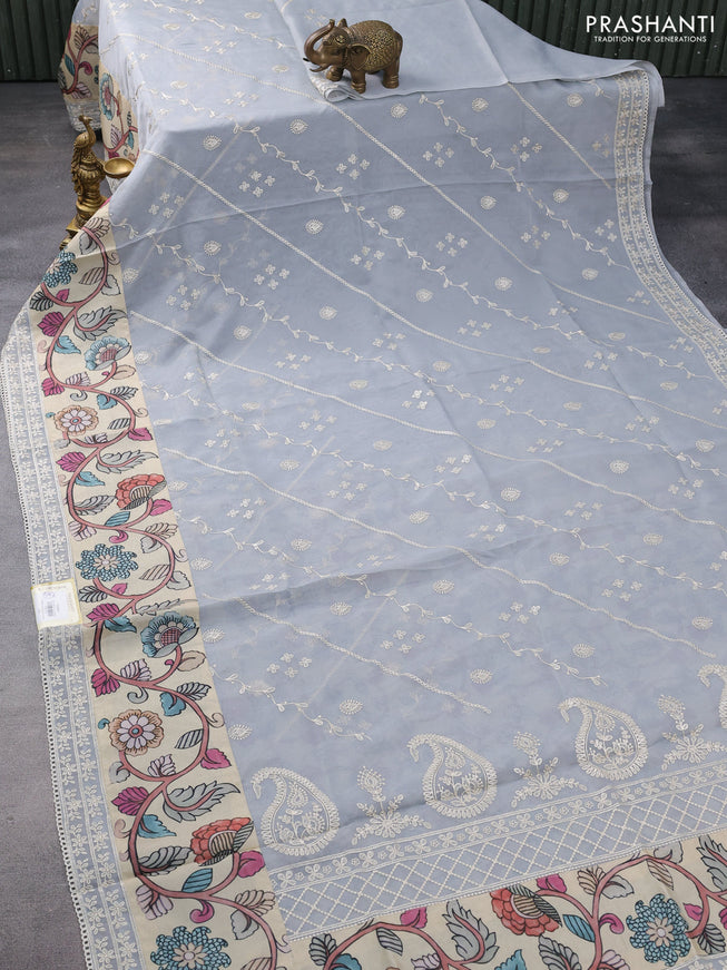 Semi organza saree pastel grey and beige with allover embroidery work and applique pallu & blouse
