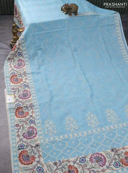 Semi organza saree pastel blue and beige with allover embroidery work and applique pallu & blouse