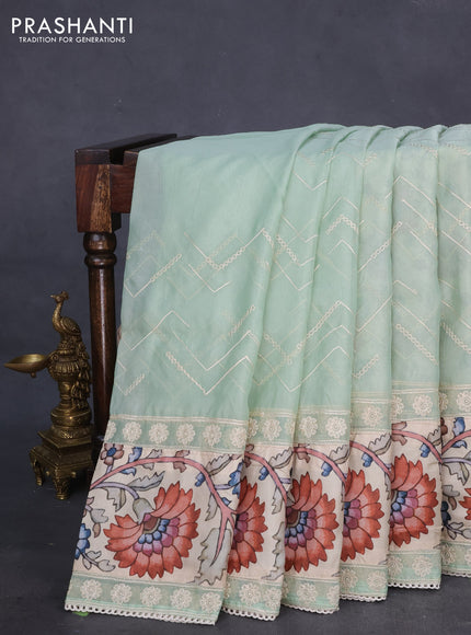 Semi organza saree pastel green and beige with allover embroidery work and applique pallu & blouse
