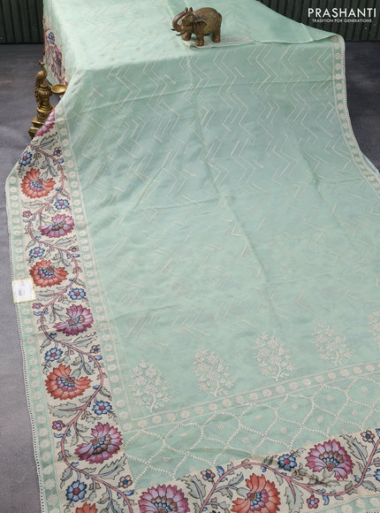 Semi organza saree pastel green and beige with allover embroidery work and applique pallu & blouse
