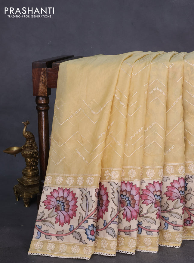 Semi organza saree sandal and beige with allover embroidery work and applique pallu & blouse