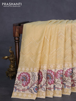 Semi organza saree sandal and beige with allover embroidery work and applique pallu & blouse