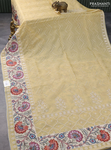 Semi organza saree sandal and beige with allover embroidery work and applique pallu & blouse