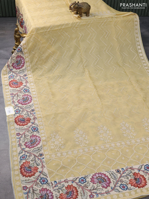 Semi organza saree sandal and beige with allover embroidery work and applique pallu & blouse