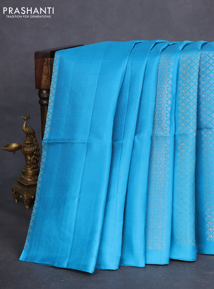 Pure soft silk saree teal blue with silver & gold zari woven peacock buttas in borderless style