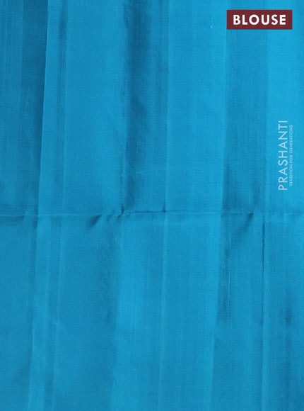 Pure soft silk saree teal blue with silver & gold zari woven peacock buttas in borderless style