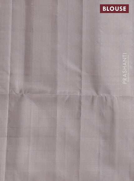 Pure soft silk saree green and pastel grey shade with allover silver zari brocade weaves and long silver zari woven border