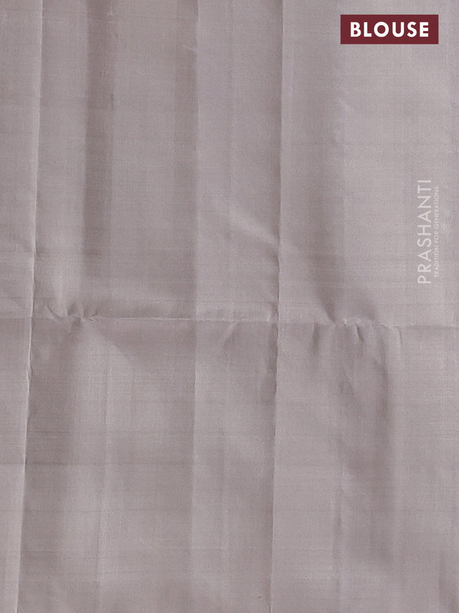 Pure soft silk saree green and pastel grey shade with allover silver zari brocade weaves and long silver zari woven border