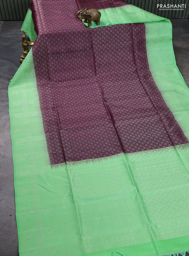 Pure soft silk saree deep wine shade and fluorescent green with allover silver zari brocade weaves and long silver zari woven border