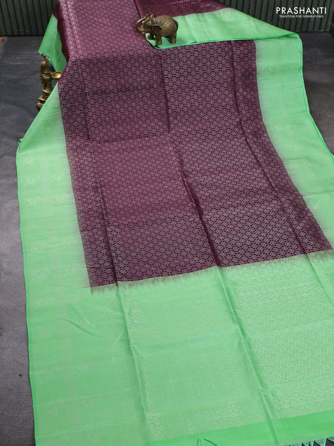 Pure soft silk saree deep wine shade and fluorescent green with allover silver zari brocade weaves and long silver zari woven border