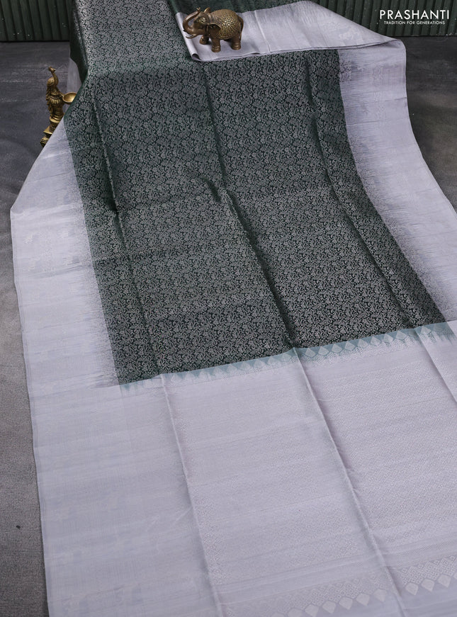 Pure soft silk saree bottle green and pastel grey with allover silver zari brocade weaves and long silver zari woven border