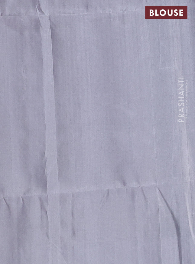 Pure soft silk saree bottle green and pastel grey with allover silver zari brocade weaves and long silver zari woven border