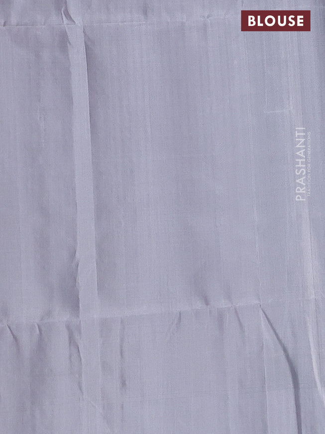 Pure soft silk saree bottle green and pastel grey with allover silver zari brocade weaves and long silver zari woven border