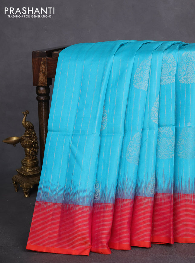 Pure soft silk saree teal blue and dual shade of pinkish orange with allover silver zari weaves & buttas and silver zari woven border
