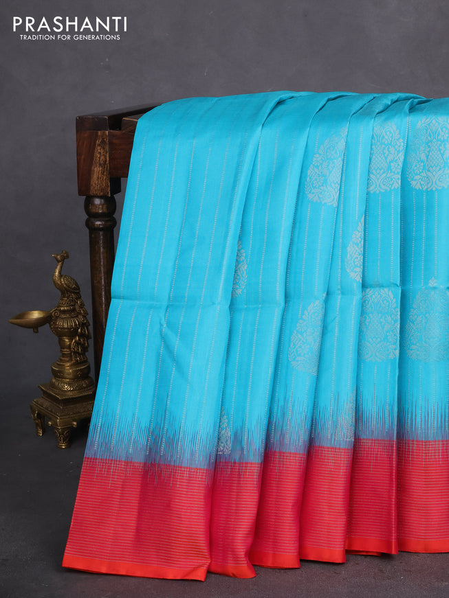 Pure soft silk saree teal blue and dual shade of pinkish orange with allover silver zari weaves & buttas and silver zari woven border