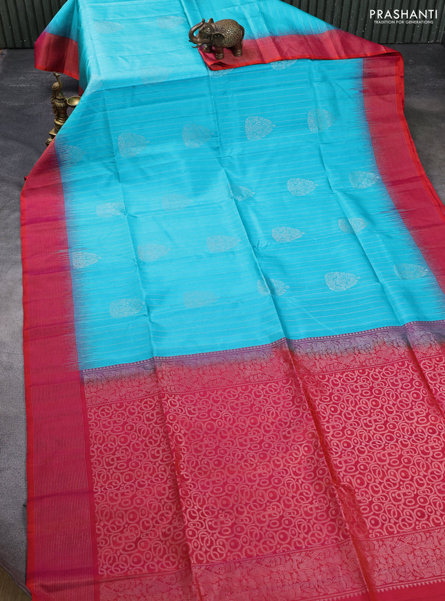 Pure soft silk saree teal blue and dual shade of pinkish orange with allover silver zari weaves & buttas and silver zari woven border
