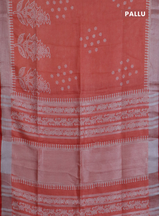 Pure linen saree pale orange and red with allover prints and silver zari woven border