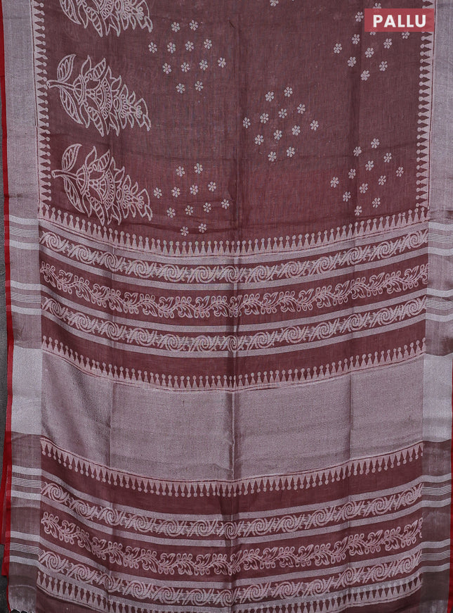 Pure linen saree pastel brown and red with allover prints and silver zari woven border