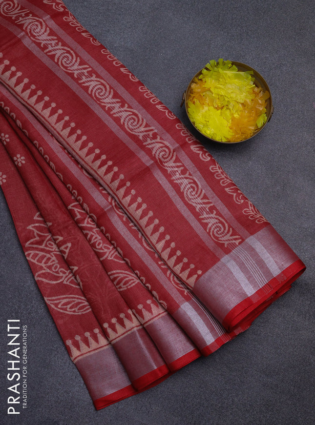 Pure linen saree maroon with allover prints and silver zari woven border
