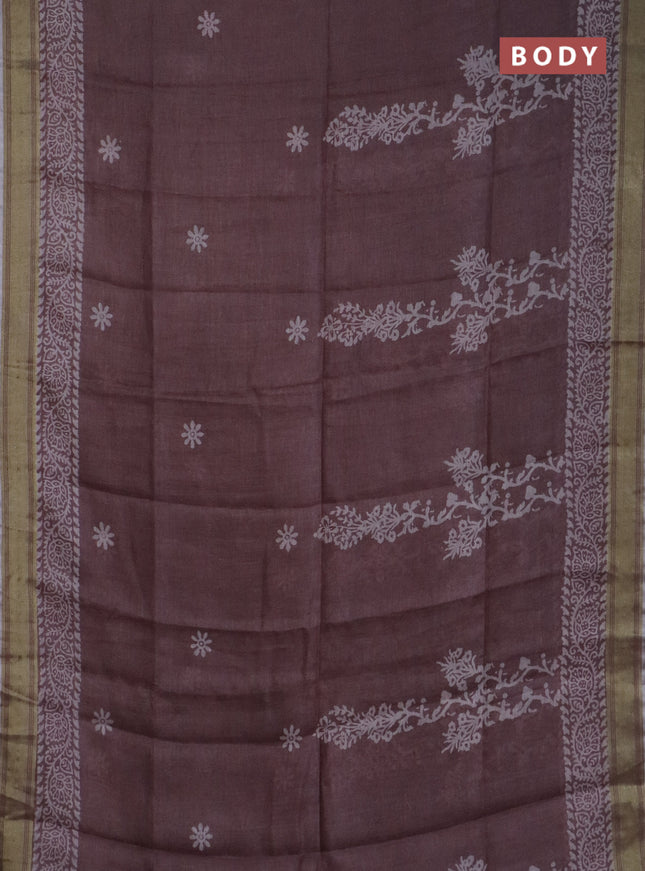 Pure linen saree pastel brown with allover prints and silver zari woven border