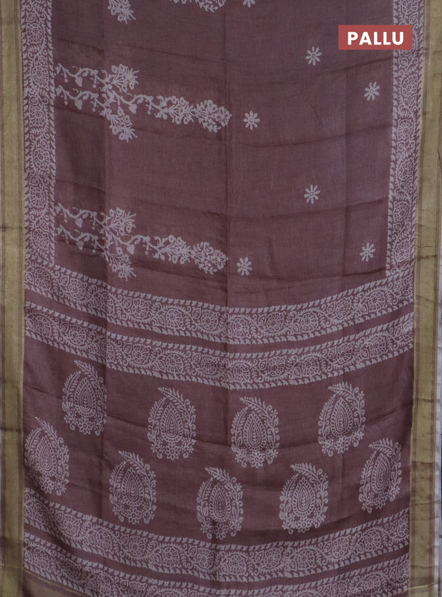 Pure linen saree pastel brown with allover prints and silver zari woven border