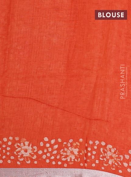 Pure linen saree orange with allover batik butta prints and silver zari woven border