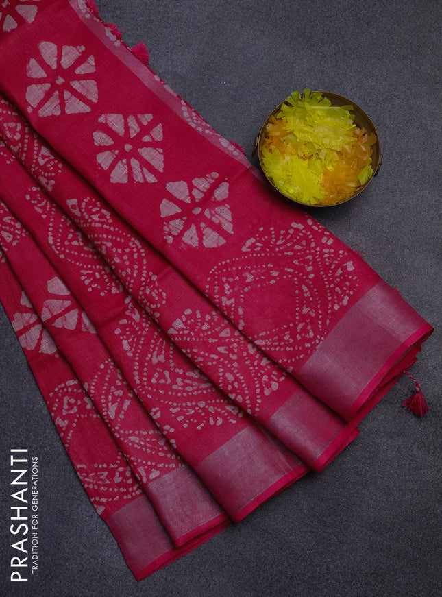 Pure linen saree pink with allover batik prints and silver zari woven border