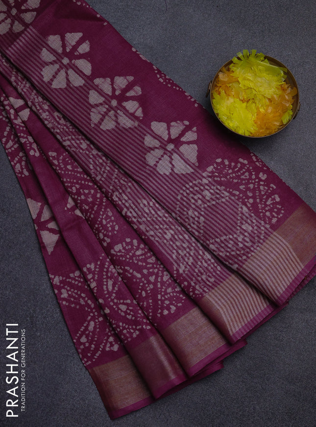 Pure linen saree wine shade with allover batik prints and silver zari woven border