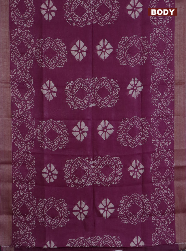 Pure linen saree wine shade with allover batik prints and silver zari woven border