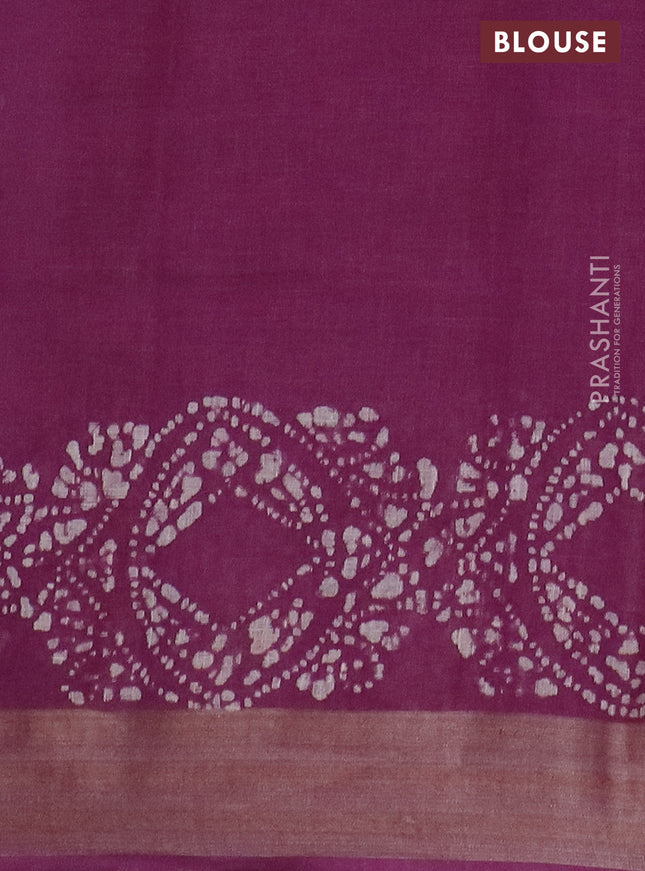 Pure linen saree wine shade with allover batik prints and silver zari woven border