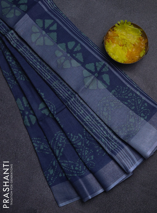 Pure linen saree bluish grey with allover batik prints and silver zari woven border