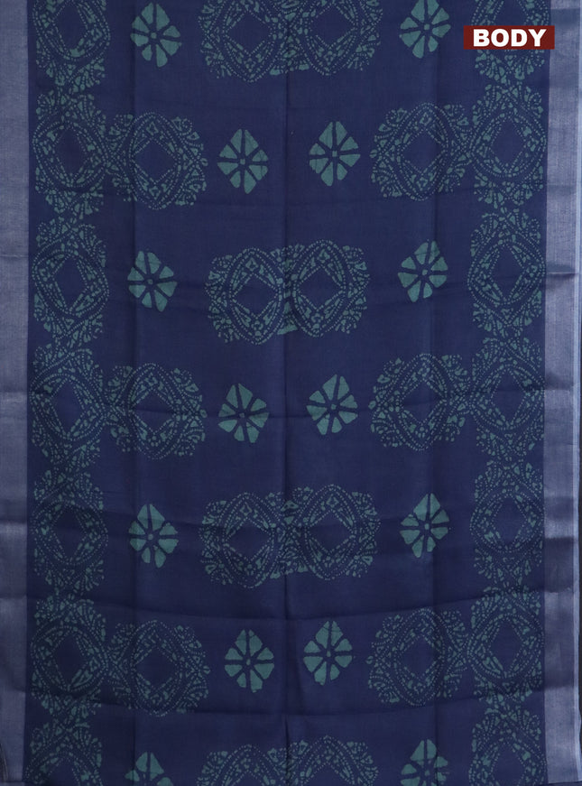 Pure linen saree bluish grey with allover batik prints and silver zari woven border