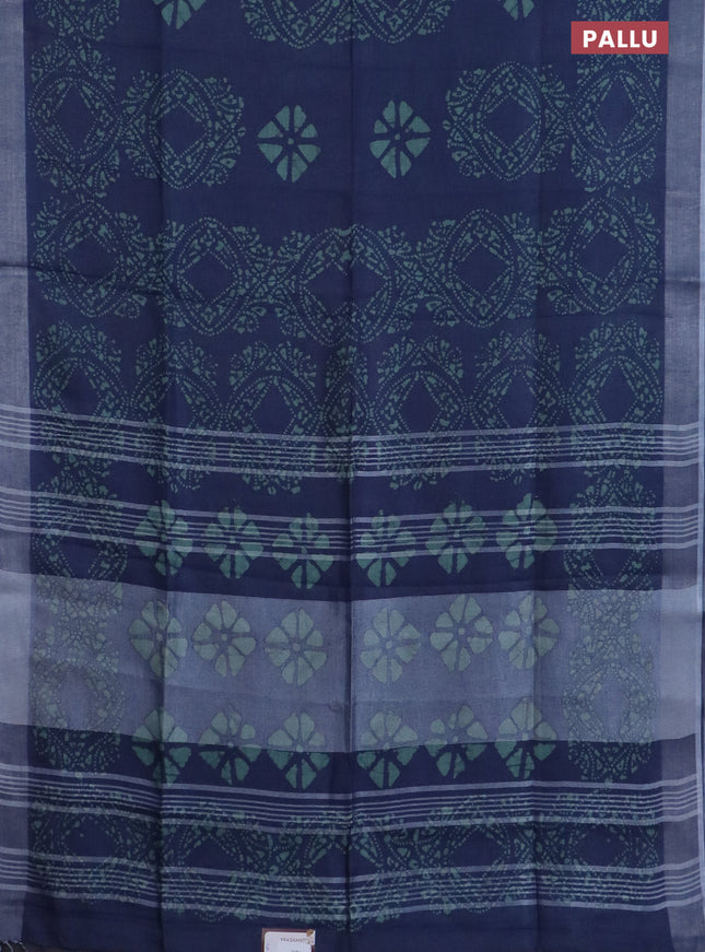Pure linen saree bluish grey with allover batik prints and silver zari woven border