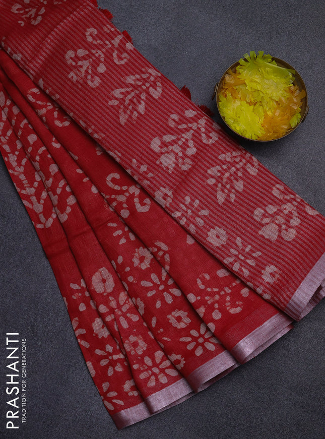Pure linen saree red with allover batik prints and silver zari woven border