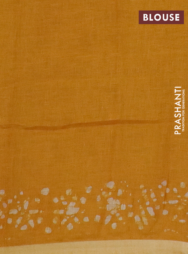 Pure linen saree mustard yellow with batik butta prints and silver zari woven border