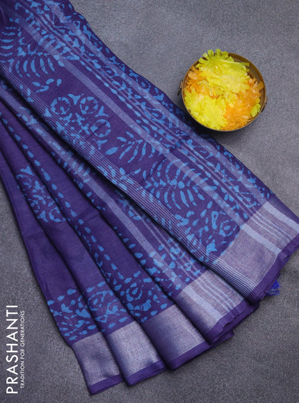 Pure linen saree violet shade with batik butta prints and silver zari woven border