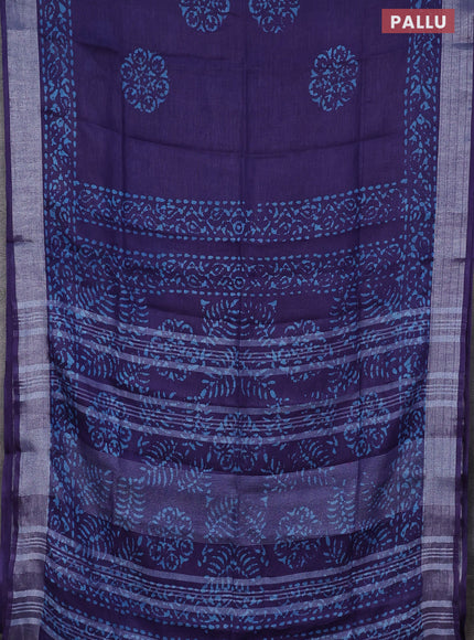 Pure linen saree violet shade with batik butta prints and silver zari woven border
