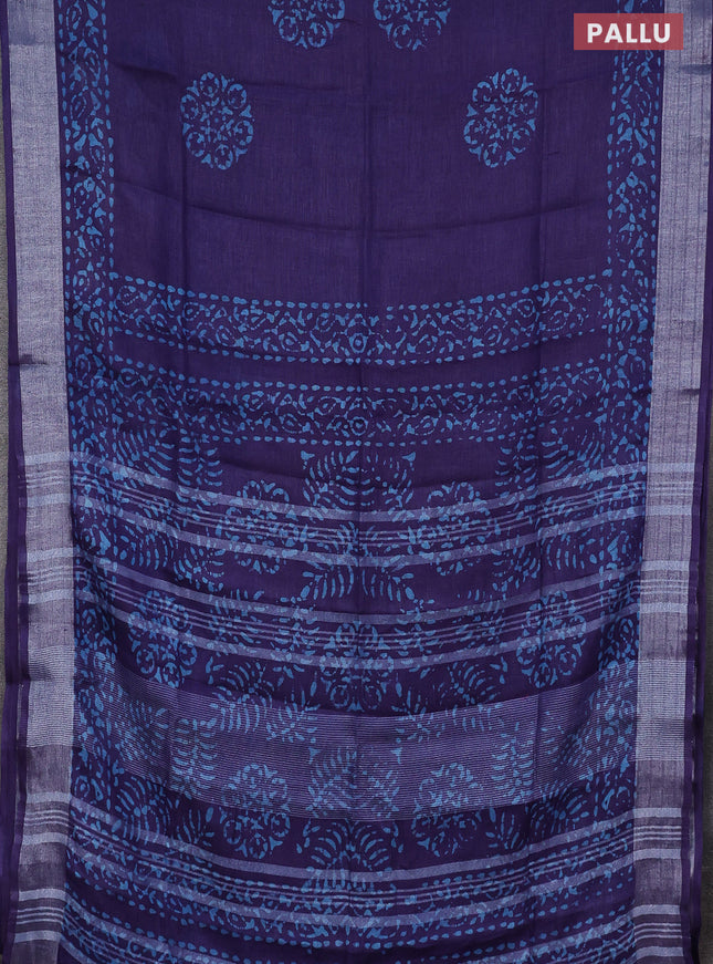 Pure linen saree violet shade with batik butta prints and silver zari woven border