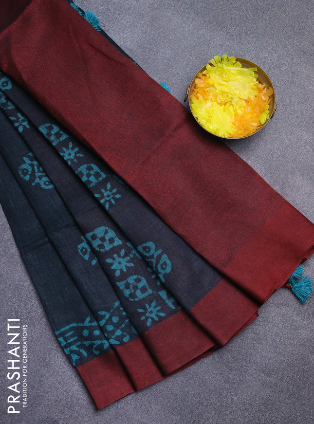 Pure linen saree deep bottle green and maroon with batik butta prints and simple border