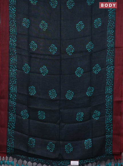 Pure linen saree deep bottle green and maroon with batik butta prints and simple border